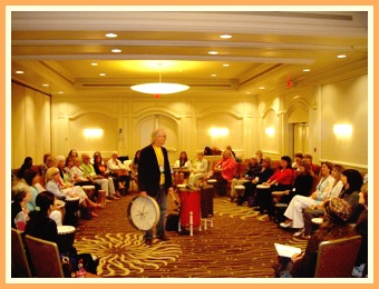 Stephen Dolle facilitating a Drumming for Wellness workshop at the 2010 UCI Women's Wellness Day.